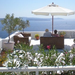 Greek patio with oleander and potted plants